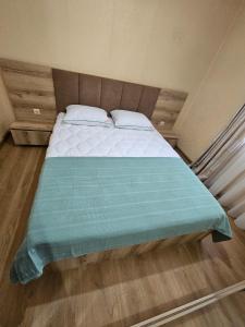 Postel nebo postele na pokoji v ubytování Guest House Gulba
