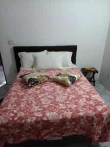 Ένα ή περισσότερα κρεβάτια σε δωμάτιο στο Casa Primeiro Andar