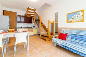 Kuchyň nebo kuchyňský kout v ubytování Villaggio Le Acacie