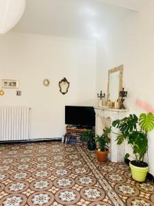 TV a/nebo společenská místnost v ubytování Chez Marion + 11 fotografií