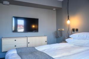 Voodi või voodid majutusasutuse Blomlöfs Hotell Saltö toas