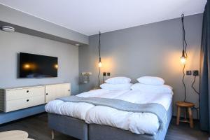 Voodi või voodid majutusasutuse Blomlöfs Hotell Saltö toas