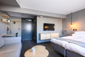 Voodi või voodid majutusasutuse Blomlöfs Hotell Saltö toas