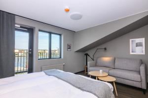 Voodi või voodid majutusasutuse Blomlöfs Hotell Saltö toas