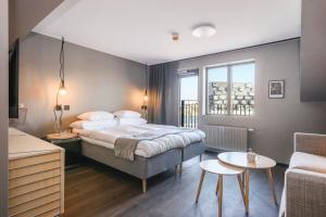 Voodi või voodid majutusasutuse Blomlöfs Hotell Saltö toas