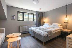 Voodi või voodid majutusasutuse Blomlöfs Hotell Saltö toas