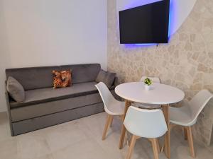 Μια τηλεόραση ή/και κέντρο ψυχαγωγίας στο Casa Vacanze Serenity