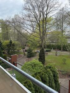 a balcony with a view of a park at Apartament Rodzinny Zielone Tarasy in Skorka