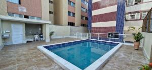 Swimmingpoolen hos eller tæt på COARM0100 - Condomínio Praia dos Coqueiros