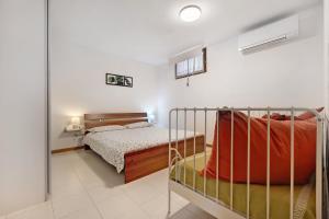 Ένα ή περισσότερα κρεβάτια σε δωμάτιο στο Casa Edda - Sole