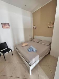 A bed or beds in a room at Leam Apartment 5