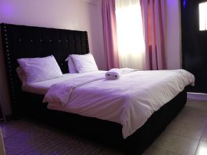 Voodi või voodid majutusasutuse BNB IN KISUMu toas