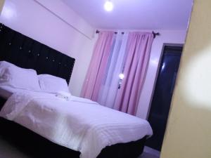 Voodi või voodid majutusasutuse BNB IN KISUMu toas