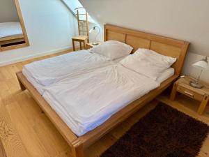 En eller flere senge i et værelse på Haus im Halligweg 20 + 37 billeder