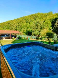 Bazén v ubytování Relax Wellness Apartman nebo v jeho okolí