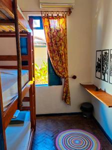 Postel nebo postele na pokoji v ubytování Pousada e Hostel Andarai
