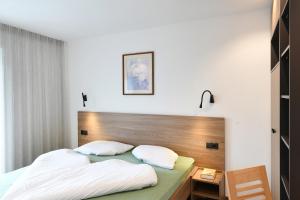 Posteľ alebo postele v izbe v ubytovaní Haus Rosengarten