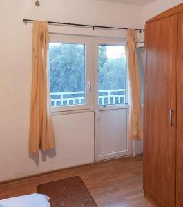 Postel nebo postele na pokoji v ubytování Apartmani Branko