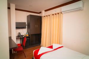 Ένα ή περισσότερα κρεβάτια σε δωμάτιο στο Hotel Juju