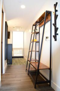 Postel nebo postele na pokoji v ubytování The Block Hotel & Commons
