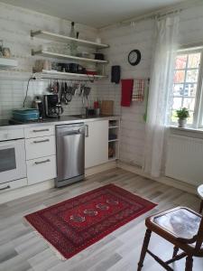 Kuchyň nebo kuchyňský kout v ubytování Ekeliden B&B