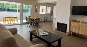 a living room with a couch and a table at Casa Rural Macondo in Trujillanos