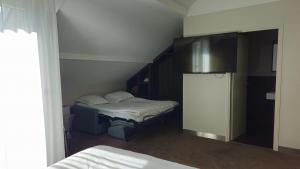 Voodi või voodid majutusasutuse Best Western Hotel Acadie Paris Nord Villepinte toas