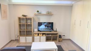 TV a/nebo společenská místnost v ubytování Avenida de Arteixo. Precioso apartamento