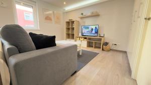 TV a/nebo společenská místnost v ubytování Avenida de Arteixo. Precioso apartamento