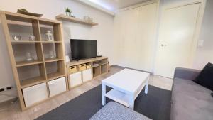 TV a/nebo společenská místnost v ubytování Avenida de Arteixo. Precioso apartamento