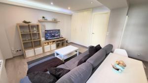 TV a/nebo společenská místnost v ubytování Avenida de Arteixo. Precioso apartamento