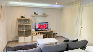 TV a/nebo společenská místnost v ubytování Avenida de Arteixo. Precioso apartamento