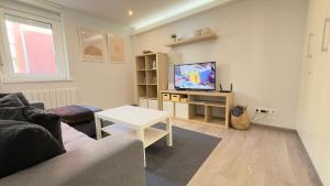TV a/nebo společenská místnost v ubytování Avenida de Arteixo. Precioso apartamento