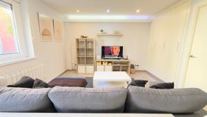 TV a/nebo společenská místnost v ubytování Avenida de Arteixo. Precioso apartamento