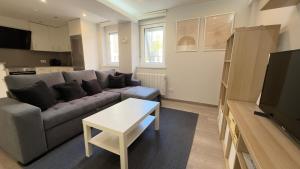 TV a/nebo společenská místnost v ubytování Avenida de Arteixo. Precioso apartamento