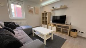 TV a/nebo společenská místnost v ubytování Avenida de Arteixo. Precioso apartamento