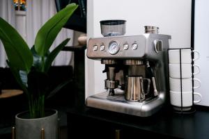 a coffee maker sitting on top of a counter at Top 1 Rated 4BR Lincoln Park House - King Bed in Chicago
