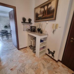 Kuchyň nebo kuchyňský kout v ubytování Appartamento Orchidea