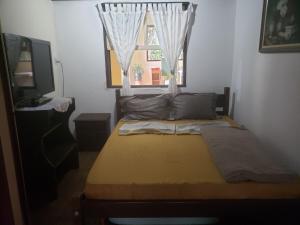 Postel nebo postele na pokoji v ubytování Casa Jabuticabeiras