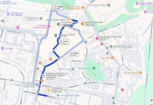 a map of a city with a blue trail at Chic Studio Steps from Windsor Castle in Windsor +2 photos