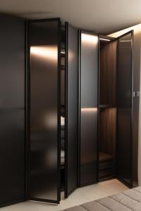 a pair of glass doors in a room at Alba Chiara in Marsala
