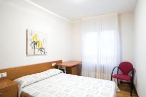 Postel nebo postele na pokoji v ubytování Apartamentos La Aurora by Clabao
