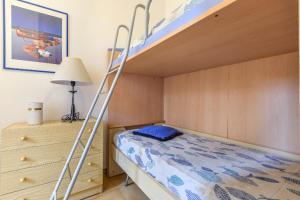 En eller flere senge i et værelse på Casa la Quercia