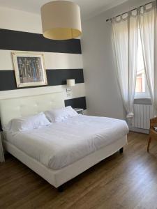 Posteľ alebo postele v izbe v ubytovaní Maison Del Magra