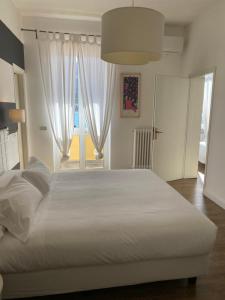 Posteľ alebo postele v izbe v ubytovaní Maison Del Magra