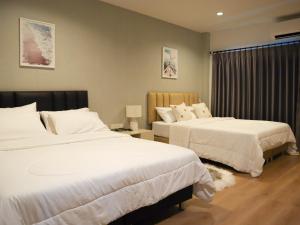A Little Nap Hometel客房内的一张或多张床位