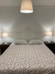 Ένα ή περισσότερα κρεβάτια σε δωμάτιο στο Casa Jacintos - Sintra, Magoito