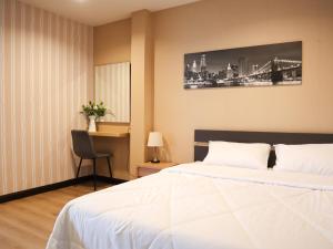 A Little Nap Hometel客房内的一张或多张床位