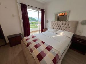 Postel nebo postele na pokoji v ubytování Bahia B&B