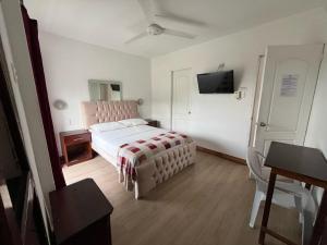 Postel nebo postele na pokoji v ubytování Bahia B&B